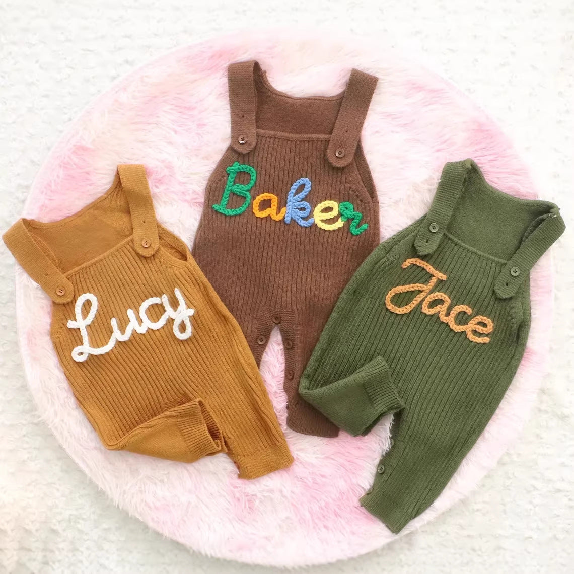 Baby wearing the knit dungarees over a long-sleeve top in an everyday indoor moment