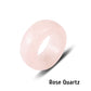 Pale rose quartz stone ring carved solid on a white background