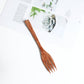 Coconut Shell Bowl with Wood Utensils | scale reference next to a hand