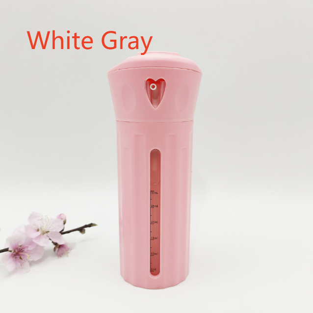Rotating four compartment travel bottle set shown with its color box packaging