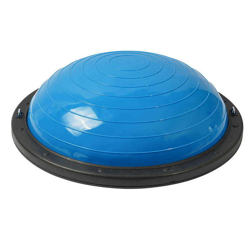 Blue half dome balance trainer at eye level, rim openings visible on both sides