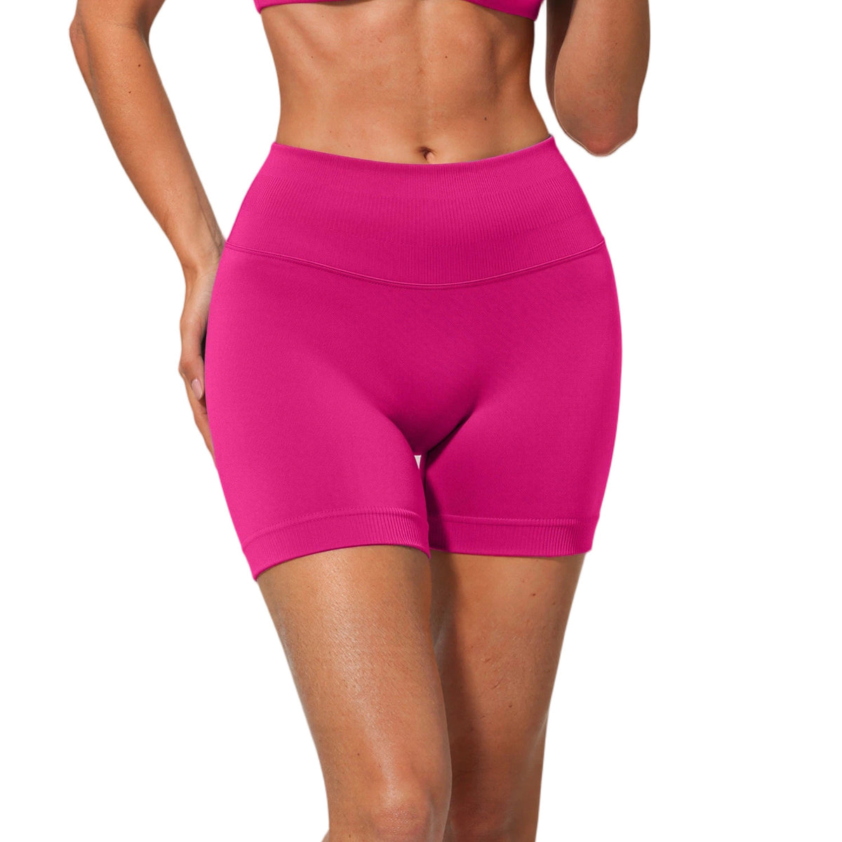 Hot pink high waisted seamless yoga shorts with a wide ribbed waistband, front view, size M option