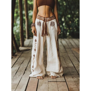 Straight tube wide leg trousers shown from the side