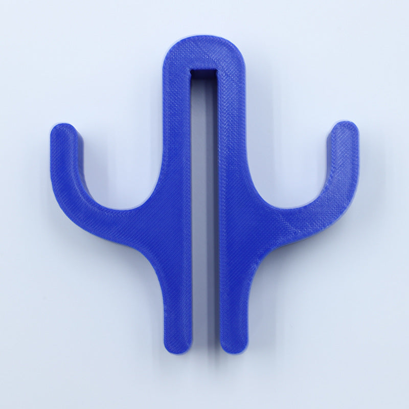 Blue resin double hook with an arm on each side, seen from the front on a light background