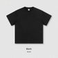 Flat lay of the heavyweight 305g cotton crew neck tee showing the boxy oversized cut and ribbed collar