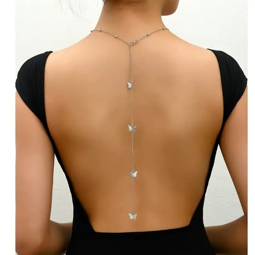 Flat lay showing the full back drape and body chain structure