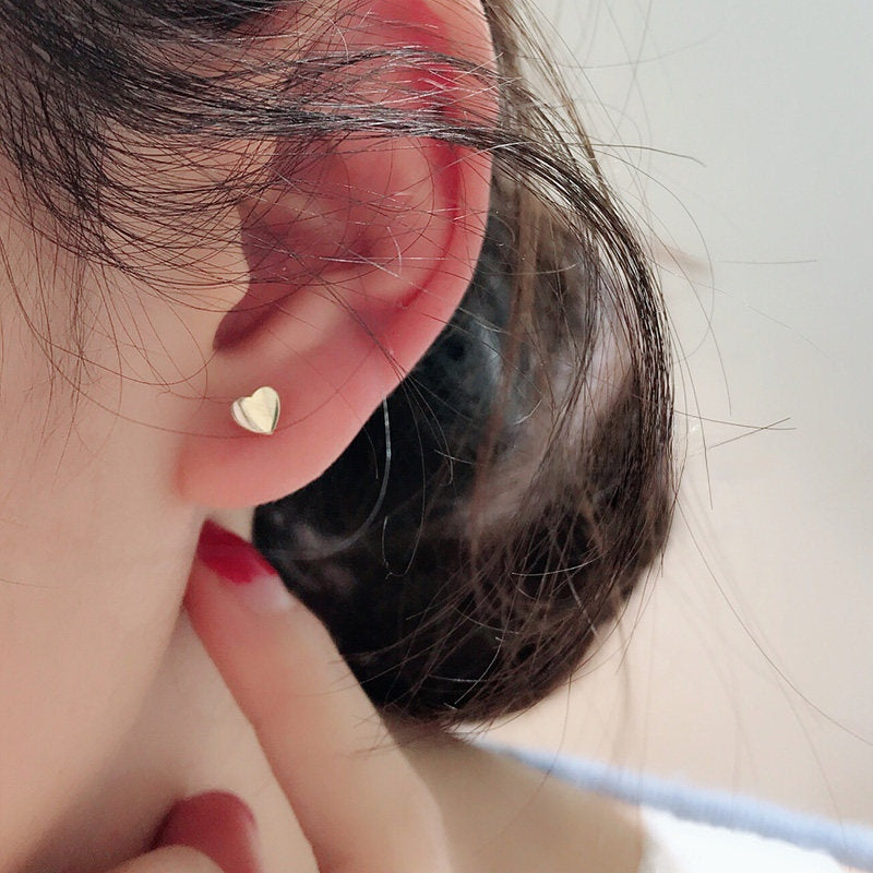 Mini heart gold stud earring in plated alloy with zircon accent, front hero view
