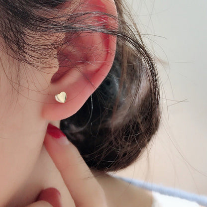 Mini heart gold stud earring in plated alloy with zircon accent, front hero view