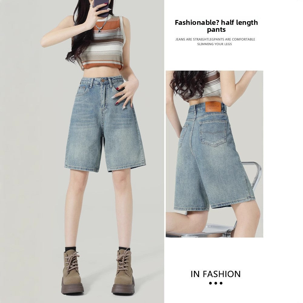 Front and back of knee-length high-waisted denim shorts in faded retro blue