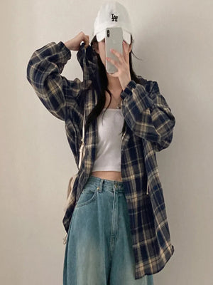 Hooded plaid shirt back view showing dropped shoulders