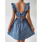 Floral square neck ruffle strap mini dress with a shirred bodice on a standing model, front view