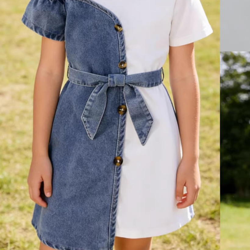 Angled hero shot of the girls' white patchwork denim dress