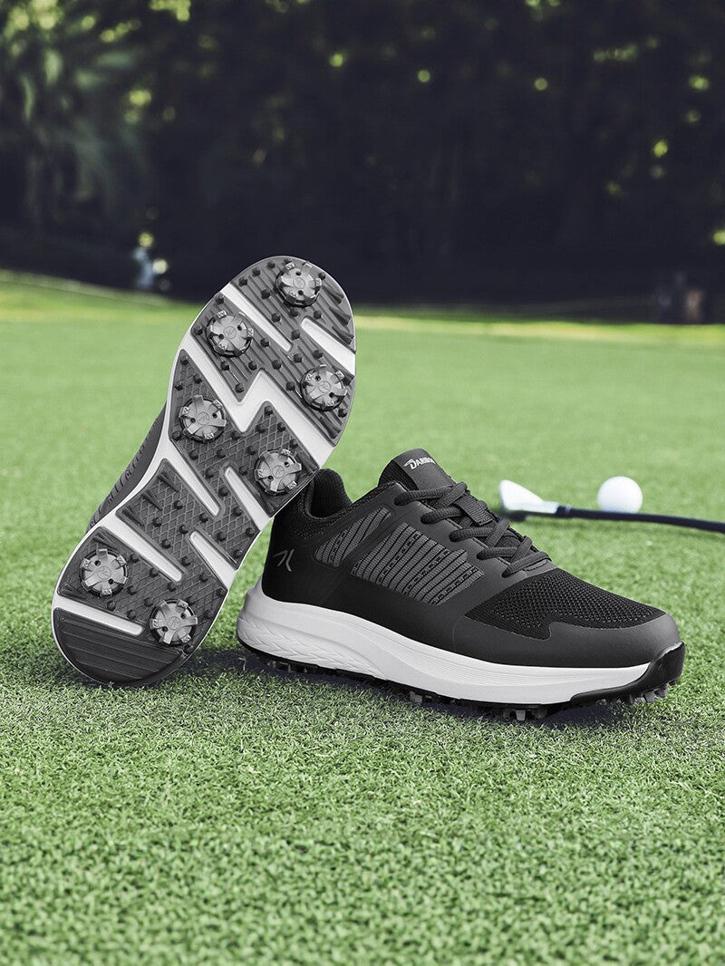 Mens breathable golf shoe with a lace up mesh upper shown from the side