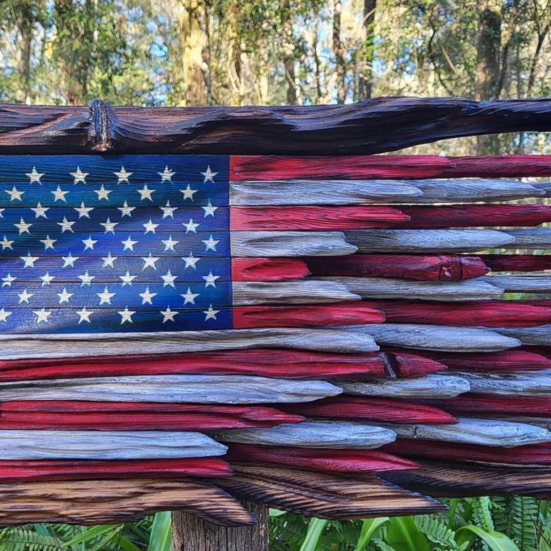 Close view of the raised red and white wooden flag stripes and painted stars