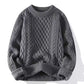 Front view of the cable twist knit crewneck pullover with braided panels running down