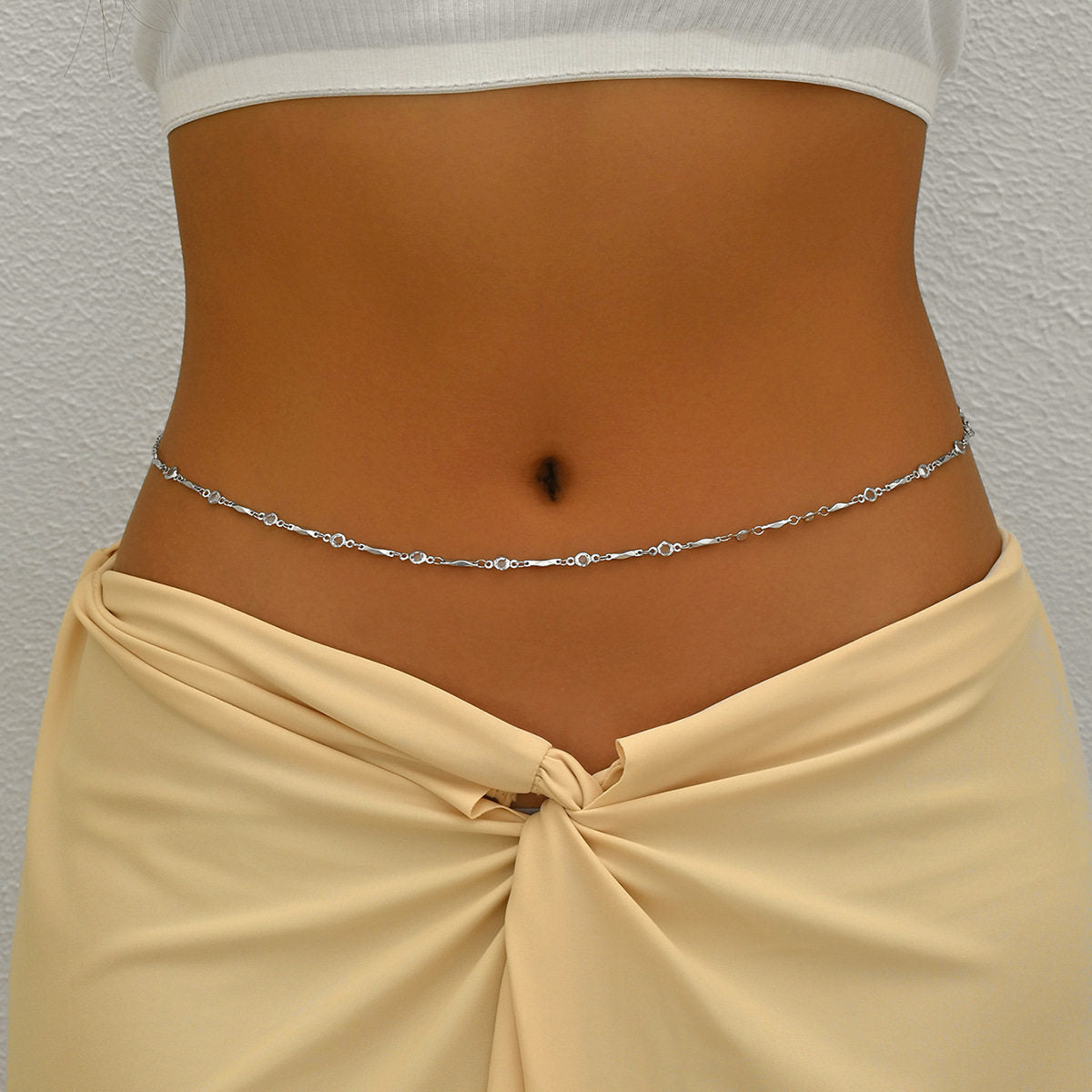 One of the waist chain designs in this range, photographed worn low across the waist
