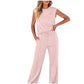 Close-up of the soft fluid fabric and drape of the wide-leg trousers