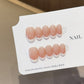 Close-up of the peach milk gradient fading into a soft French tip