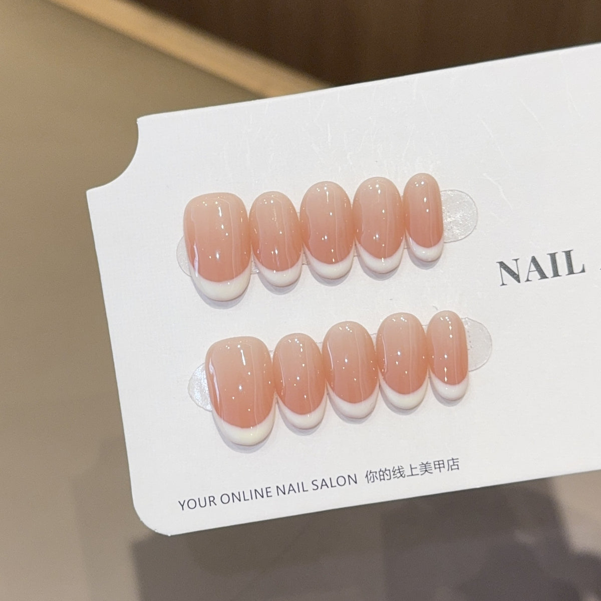 Close-up of the peach milk gradient fading into a soft French tip