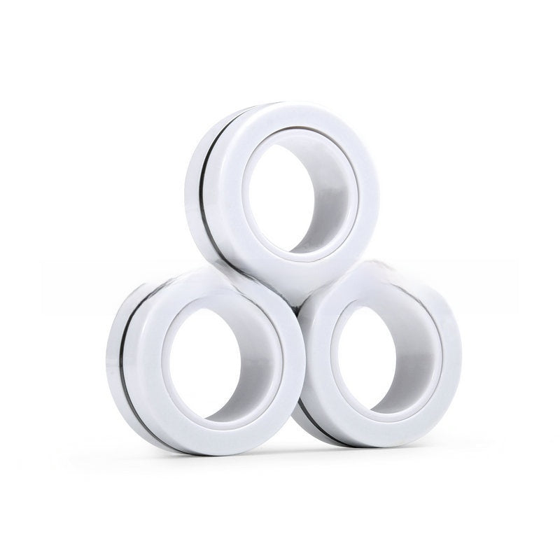 Magnetic fidget rings stacked into a short barrel
