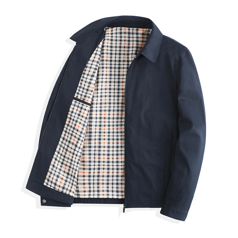 Navy cotton zip jacket with a turn-down collar and a plaid lining, shown open at the front on a white background