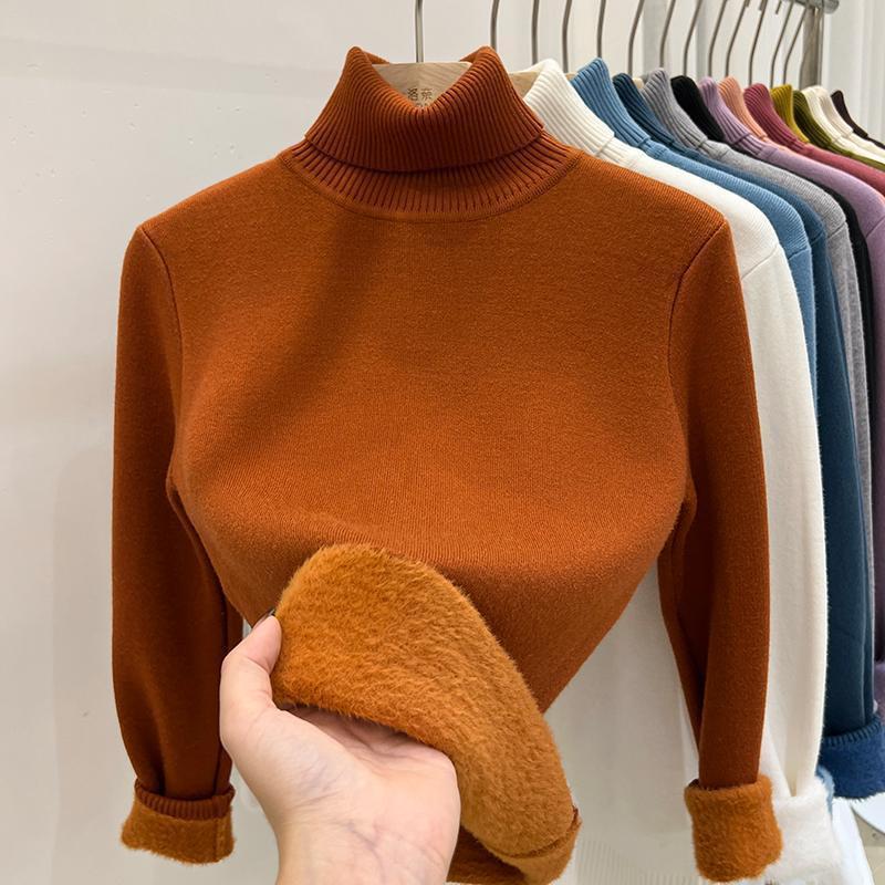 Burnt Orange high collar fleece lined knit sweater, size S option, shown on a hanger