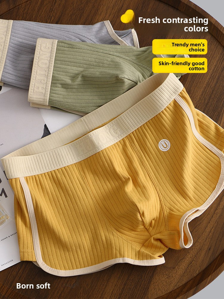 Close view of the ribbed cotton texture of a pair of men's boxer briefs