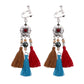 Bohemian tassel and bead clip-on drop earrings, aged tone zinc alloy frame, handmade pair on plain white background