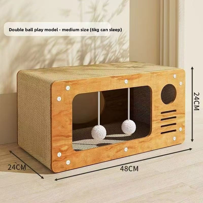Medium cardboard cat scratcher 48 by 24 by 24 centimetres with a cat sleeping inside and play balls