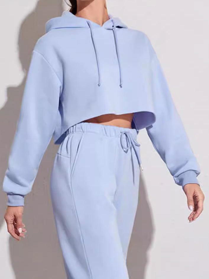 Cropped hoodie and jogger lounge set worn together in a relaxed setting