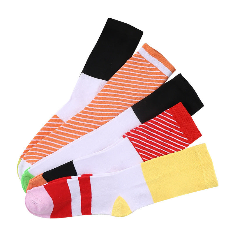 Sushi themed cotton crew socks folded into nigiri and maki shapes on a plate, playful novelty foodie gift