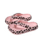 Close up of the toe post strap and leopard print footbed of the flip flops