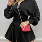Black button front mini shirt dress with smocked waist and long sleeves, option size L