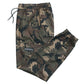 Close view of the cargo pocket and camouflage print on the lightweight jogger pants