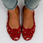 Top down view of a pair of womens woven lattice flat sandals with open diamond gaps