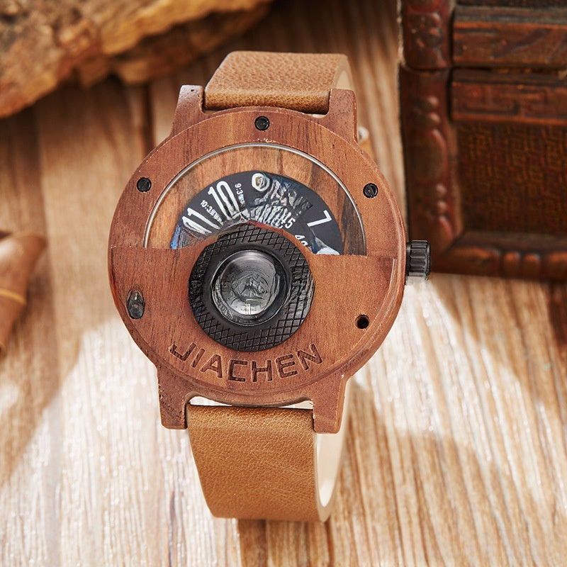 Wooden compass watch shown at a natural wearing angle on the wrist