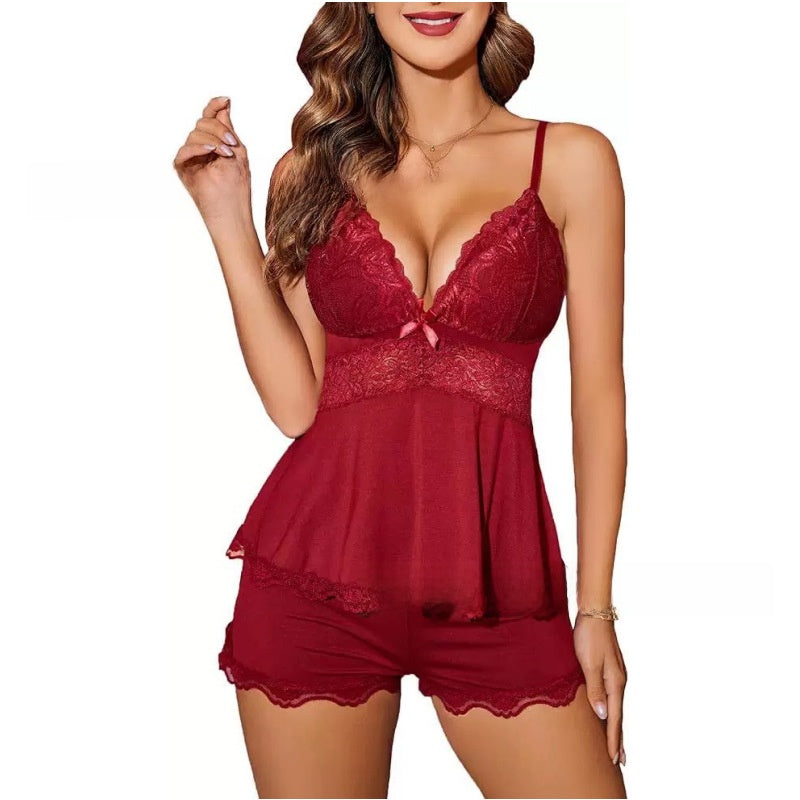 Close view of the sheer floral lace bust and thin adjustable straps of the camisole sleep set
