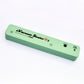 Green bar vacuum sealer with Vacuum Sealer print, two push pads and a release valve