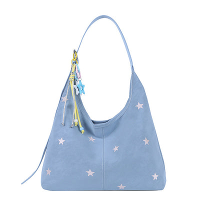 Angled hero shot of the Korean style bucket shoulder bag with star accent