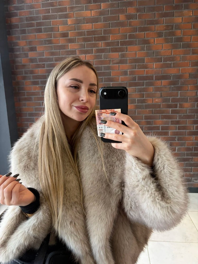 Oatmeal vegan fur short jacket with dark tipped pile and wide collar, mirror selfie