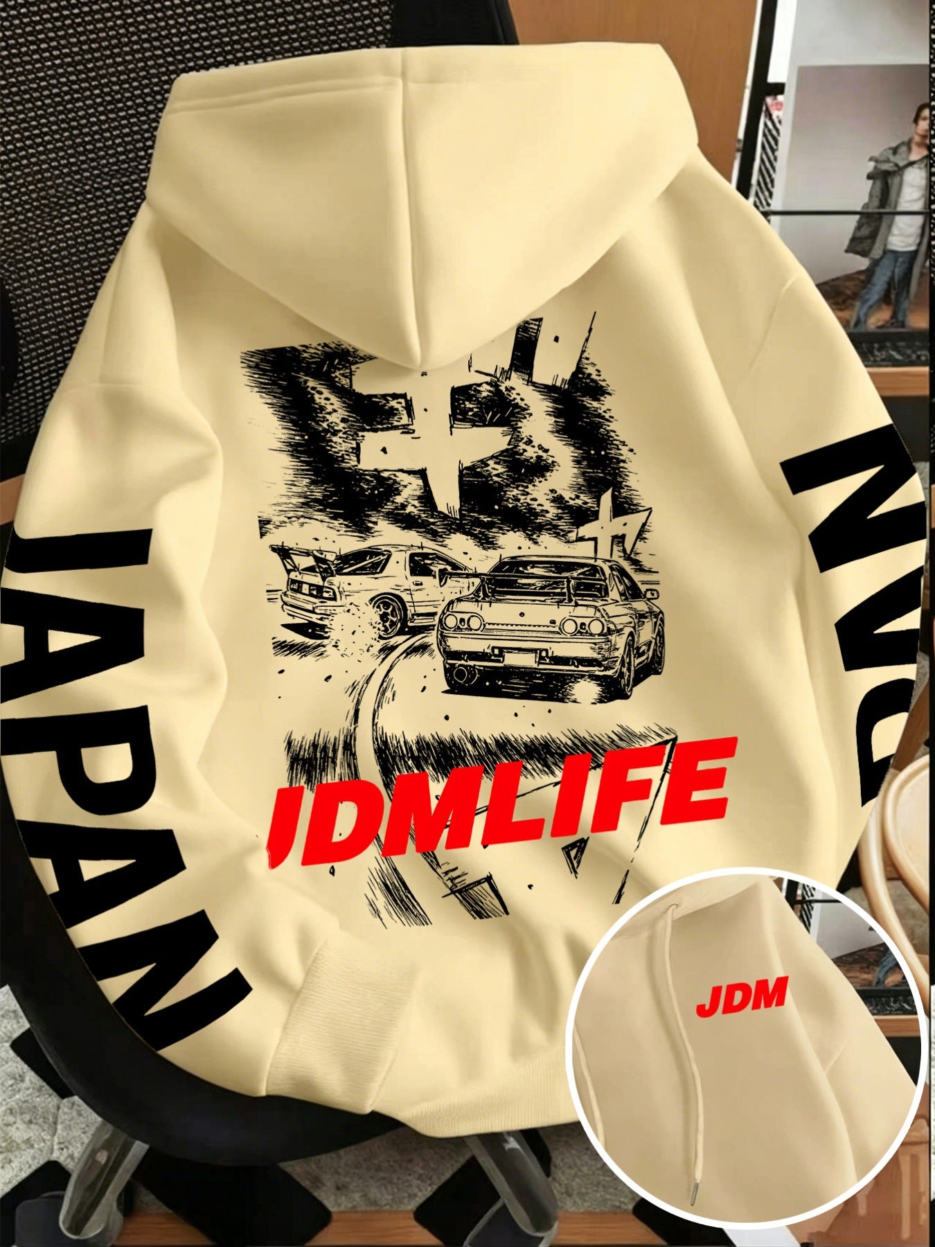 JDM drift hoodie back print with silhouetted cars on a mountain road and red JDMLIFE text