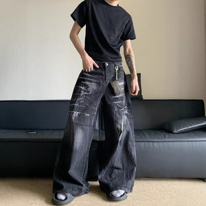 Front view of the wide leg black jeans showing the loose cut and five pockets