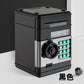 Plastic ATM piggy bank with a spinning safe handle and a numbered keypad on front