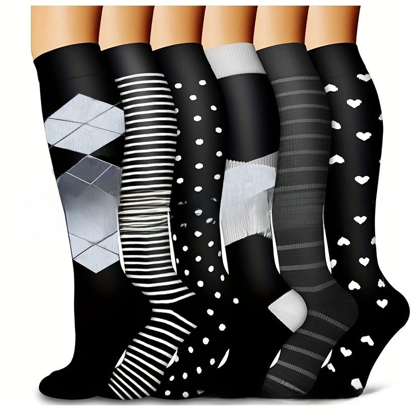 Knee high graduated compression sport socks displayed as a colour assortment