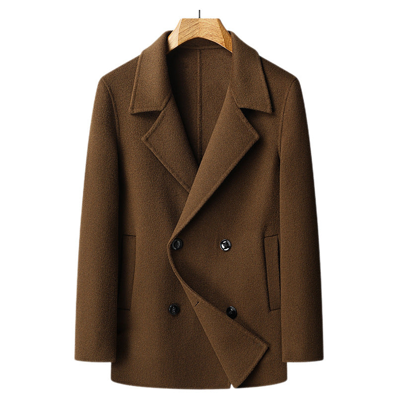Dark brown double faced wool overcoat shown flat on a wooden hanger, double breasted front view