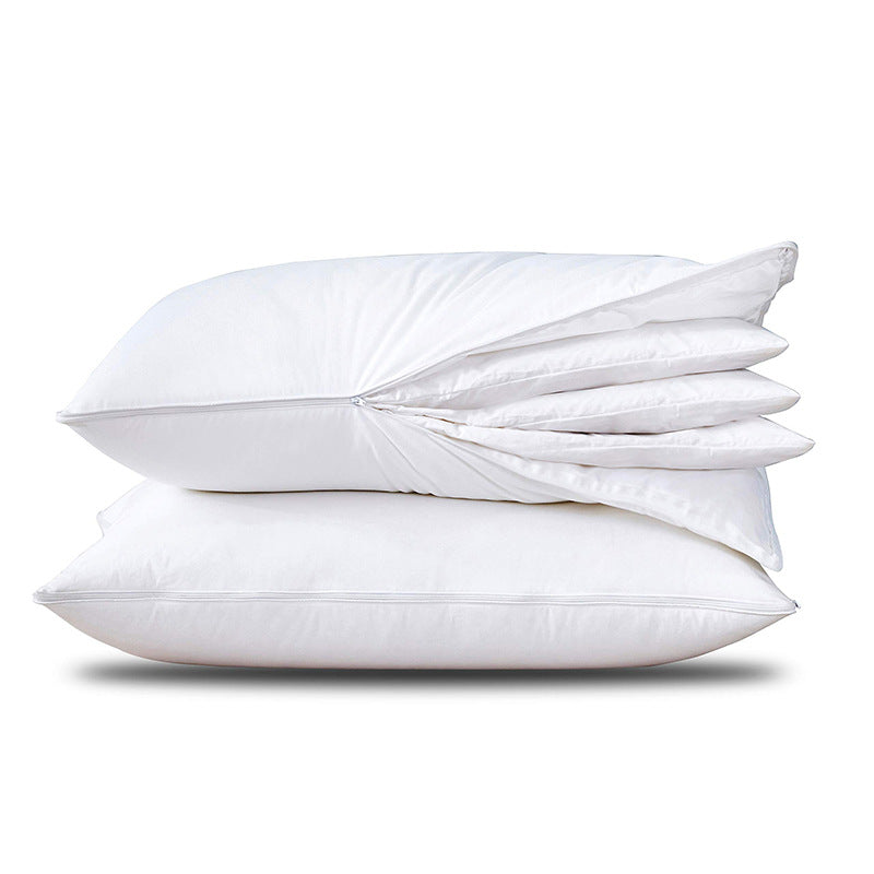 Side zip of the down pillow opened to show its three removable inner layers