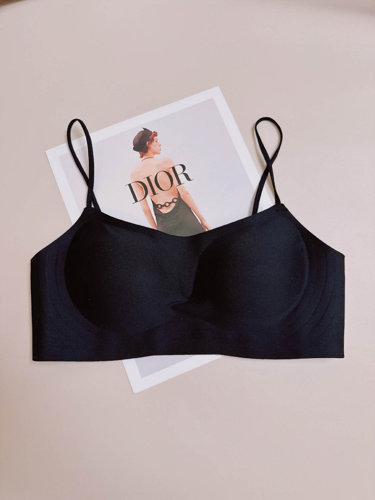 Black seamless wireless push up bralette with fixed molded cups and thin straps