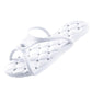 Cushioned EVA thong slipper with a between the toes strap and a quilted footbed