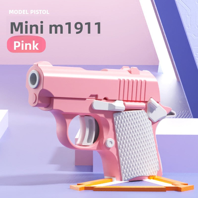 Pink and white moulded model pistol fidget shown as a colourway option on a pastel set