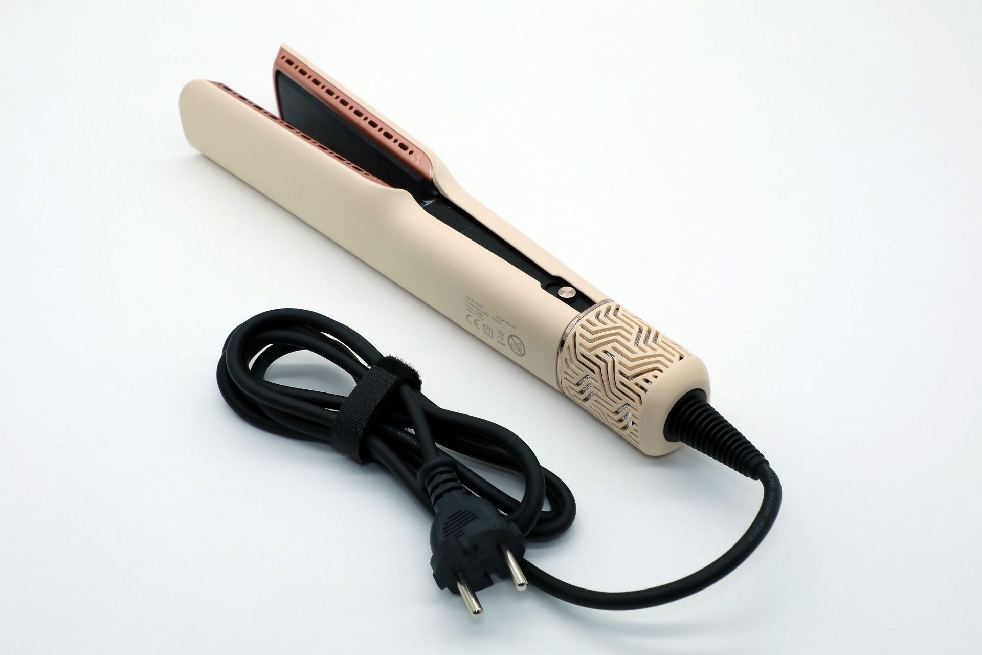 Champagne ceramic hair straightener with rose gold plates and black plug cord